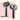 Two views of the black PurrPurr Mist-Groomer pet brush against a pink and cream background. The left view shows the bristle side with a green indicator light and USB-C port active; the right view shows the back of the brush head featuring the water reservoir cap and misting button. Text at the bottom reads "PurrPurr Mist-Grroomer 3-in-1 Tecnology."