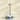 "Blue interactive treat-dispensing toy for cats with bouncing ball and turntable"